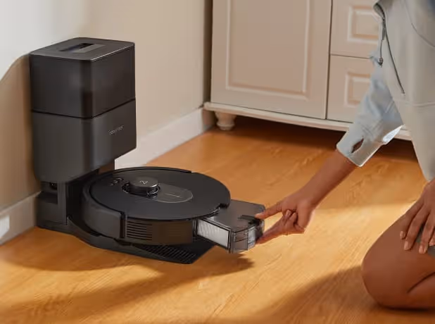Roborock Q5 Max+ robot vacuum with self-empty dock, showing smart mapping capabilities and powerful suction for comprehensive floor cleaning